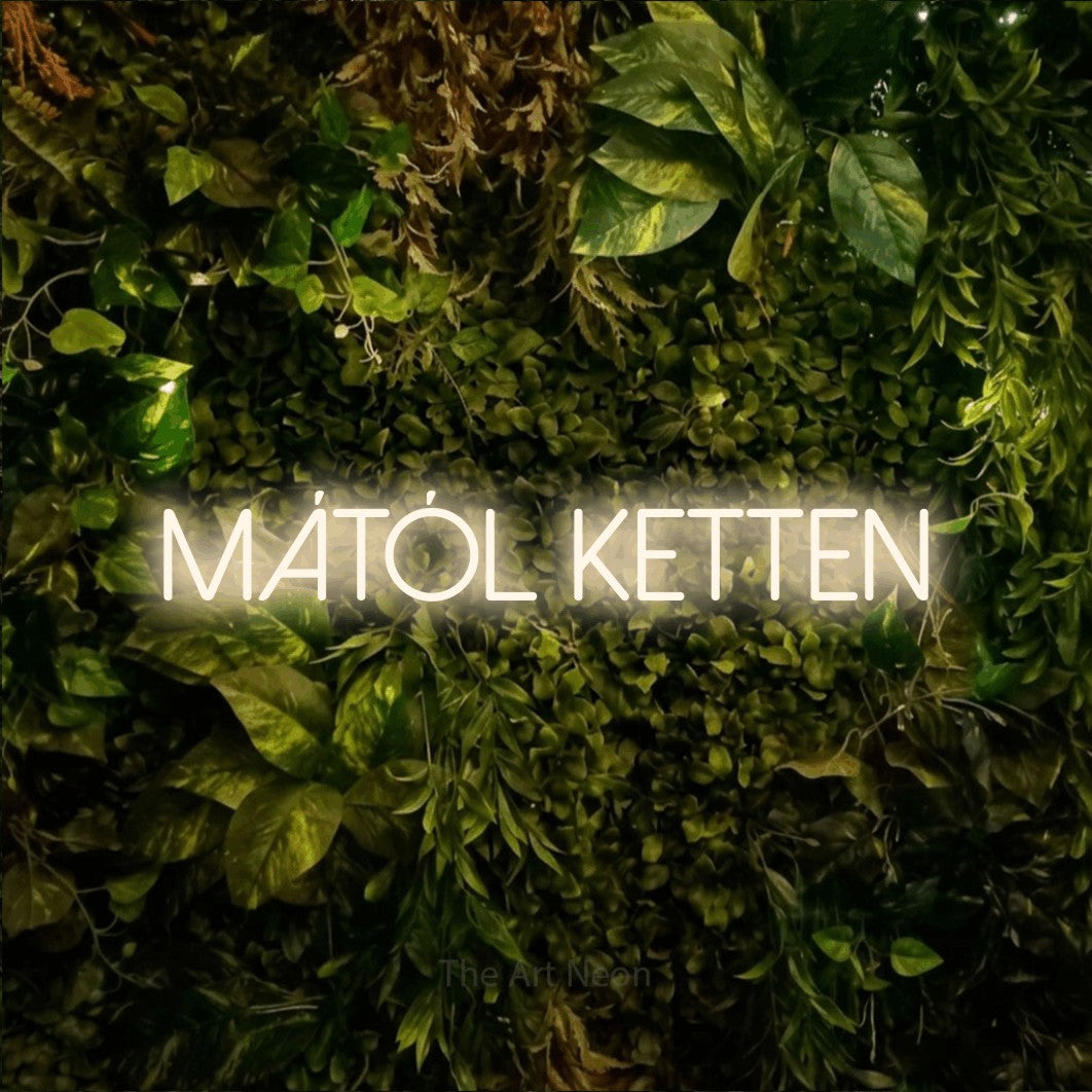 LED neon sign reading “mától ketten”, arranged in a single line.