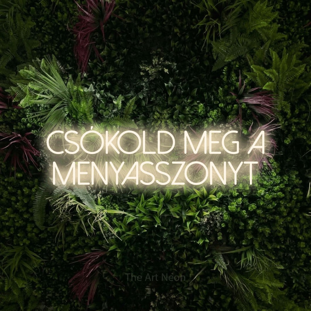 LED neon sign reading “csókold meg a MENYASSZONYT”, arranged in two lines.