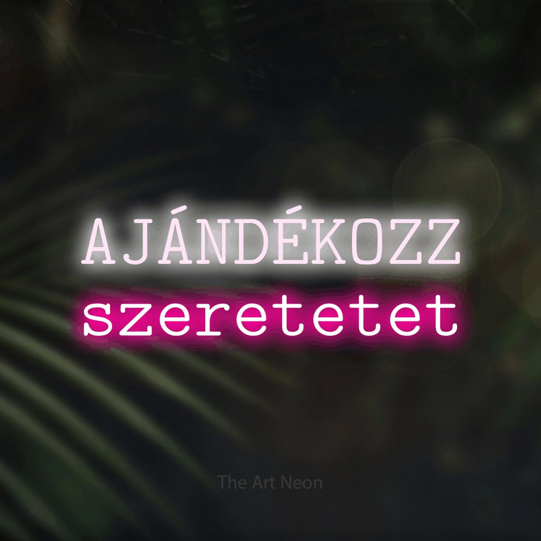 LED neon sign reading “AJÁNDÉKOZZ szeretetet”, arranged in two lines.