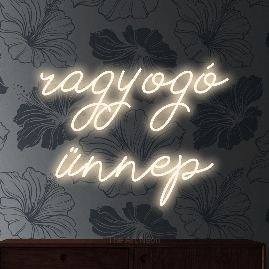 LED neon sign reading “ragyogó ünnep”, arranged in two lines.