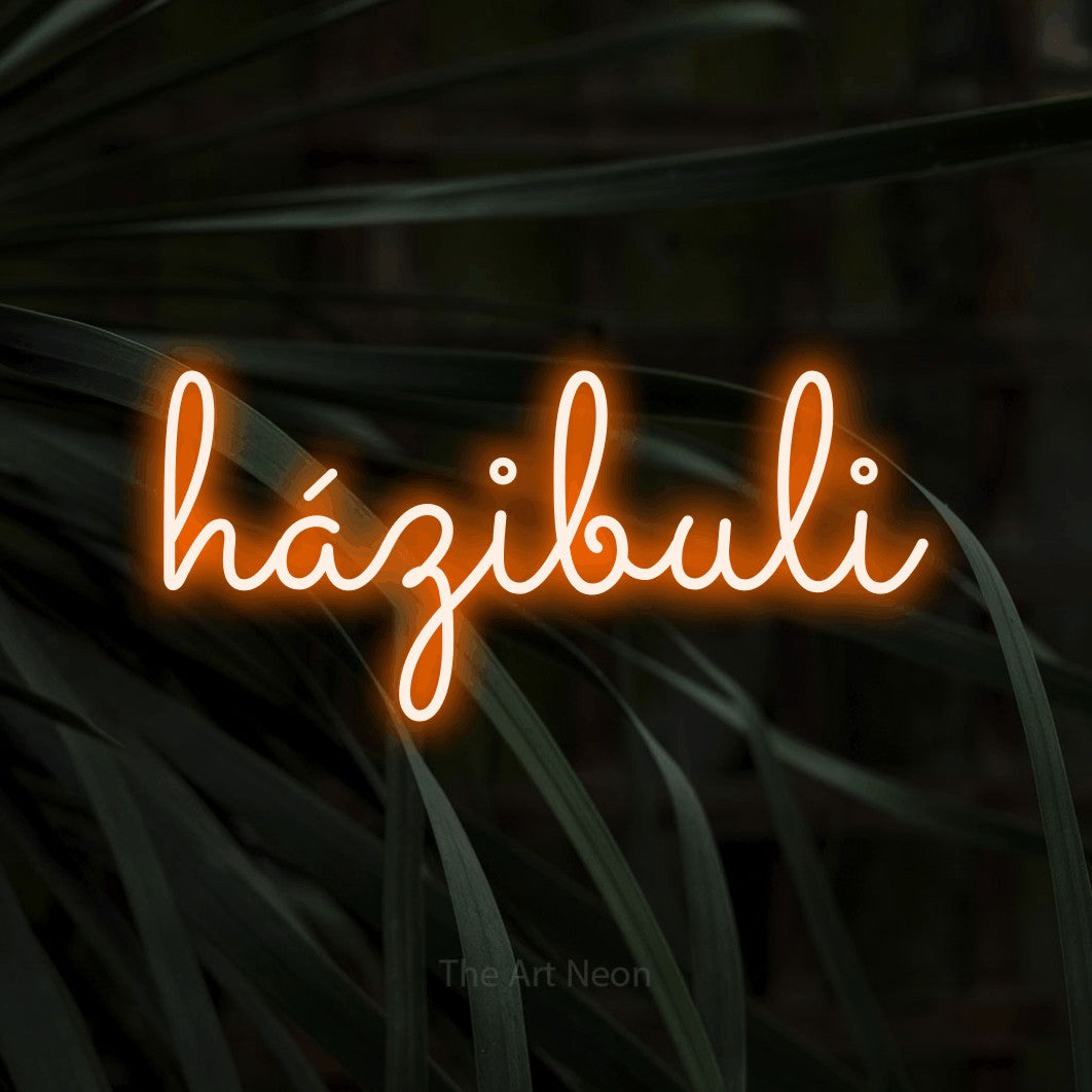 LED neon sign reading “házibuli”, arranged in a single line.