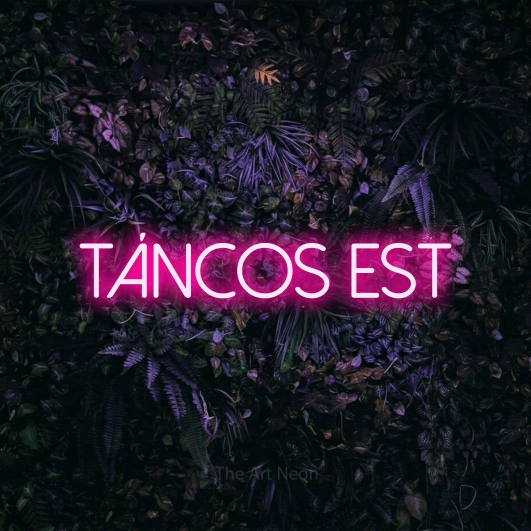 LED neon sign reading “Táncos Est”, arranged in a single line.
