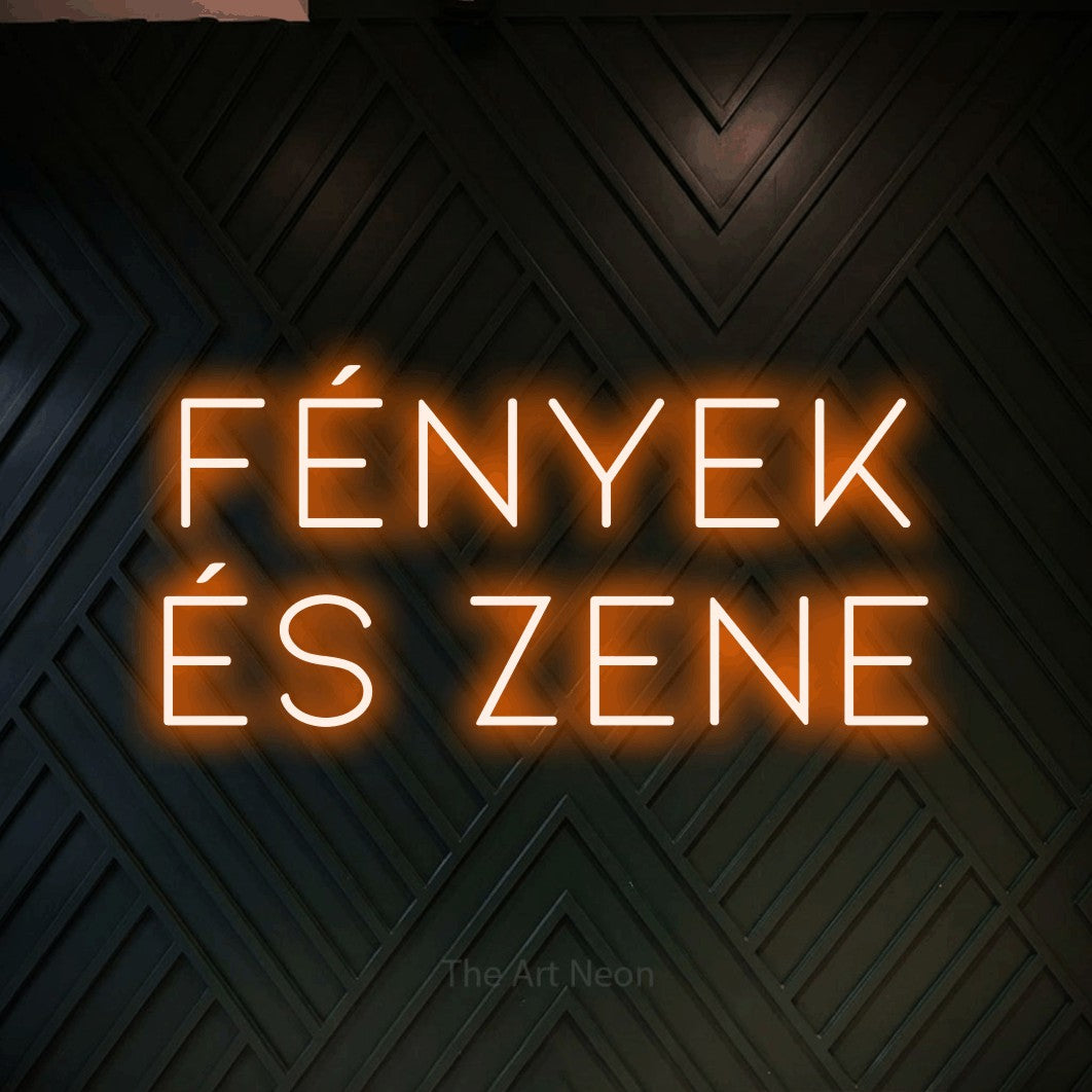 LED neon sign reading “FÉNYEK és zene”, arranged in two lines.