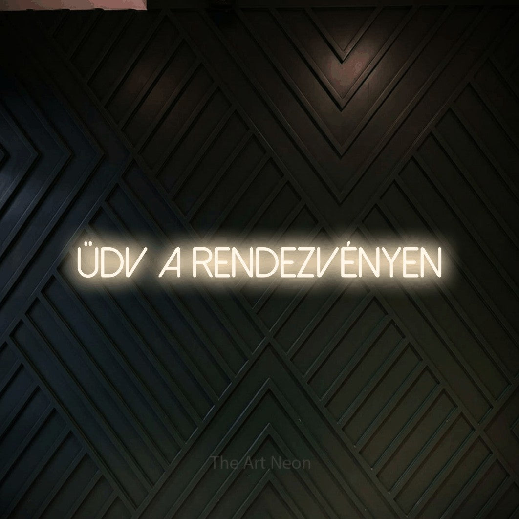 LED neon sign reading “ÜDV A RENDEZVÉNYEN”, arranged in a single line.