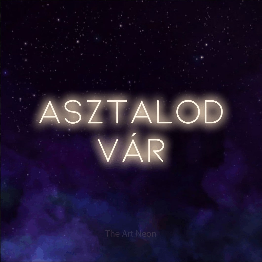 LED neon sign reading “Asztalod Vár”, arranged in two lines.