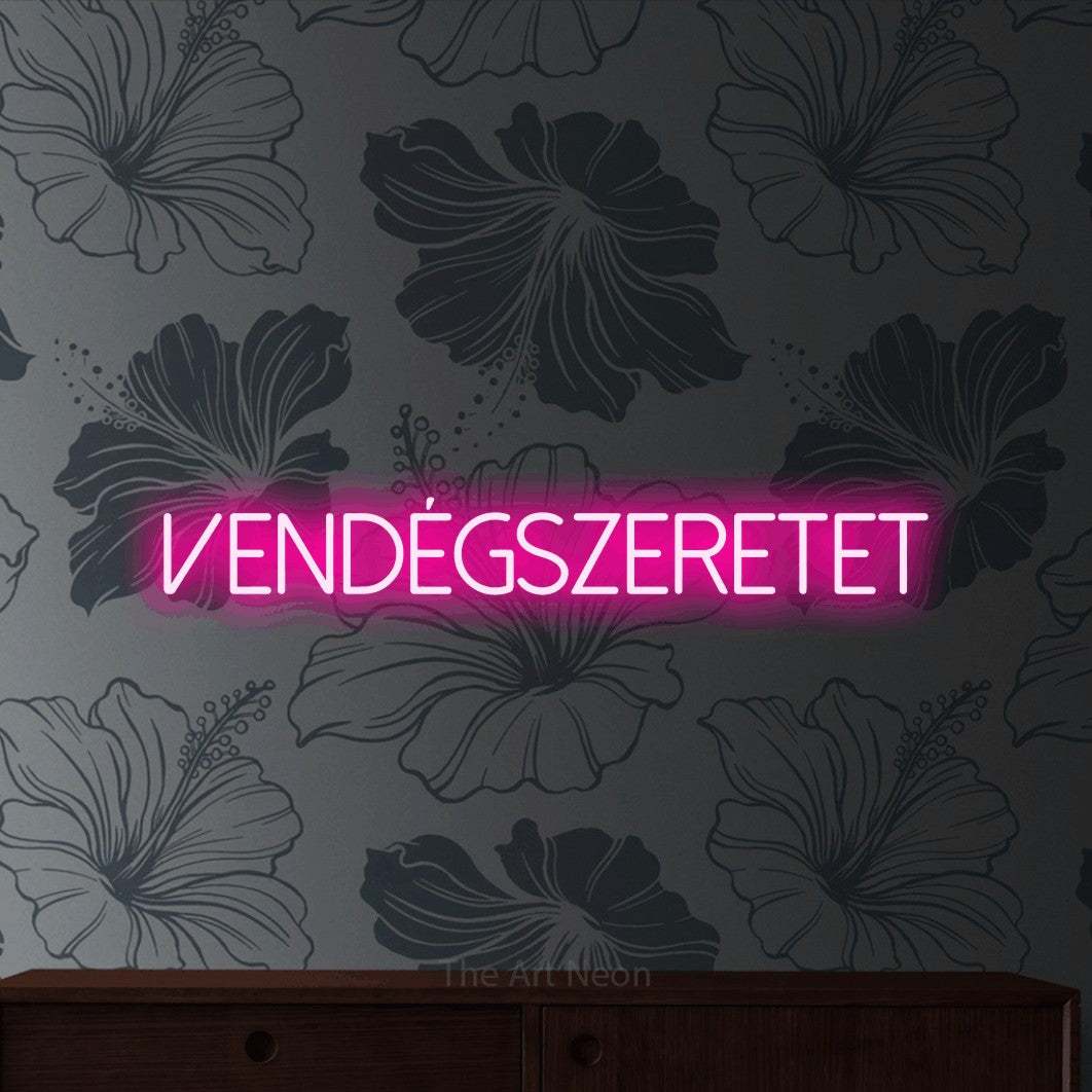LED neon sign reading “Vendégszeretet”, arranged in a single line.