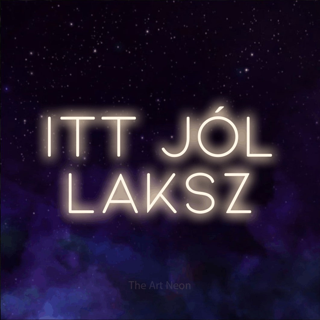 LED neon sign reading “ITT JÓL LAKSZ”, arranged in two lines.