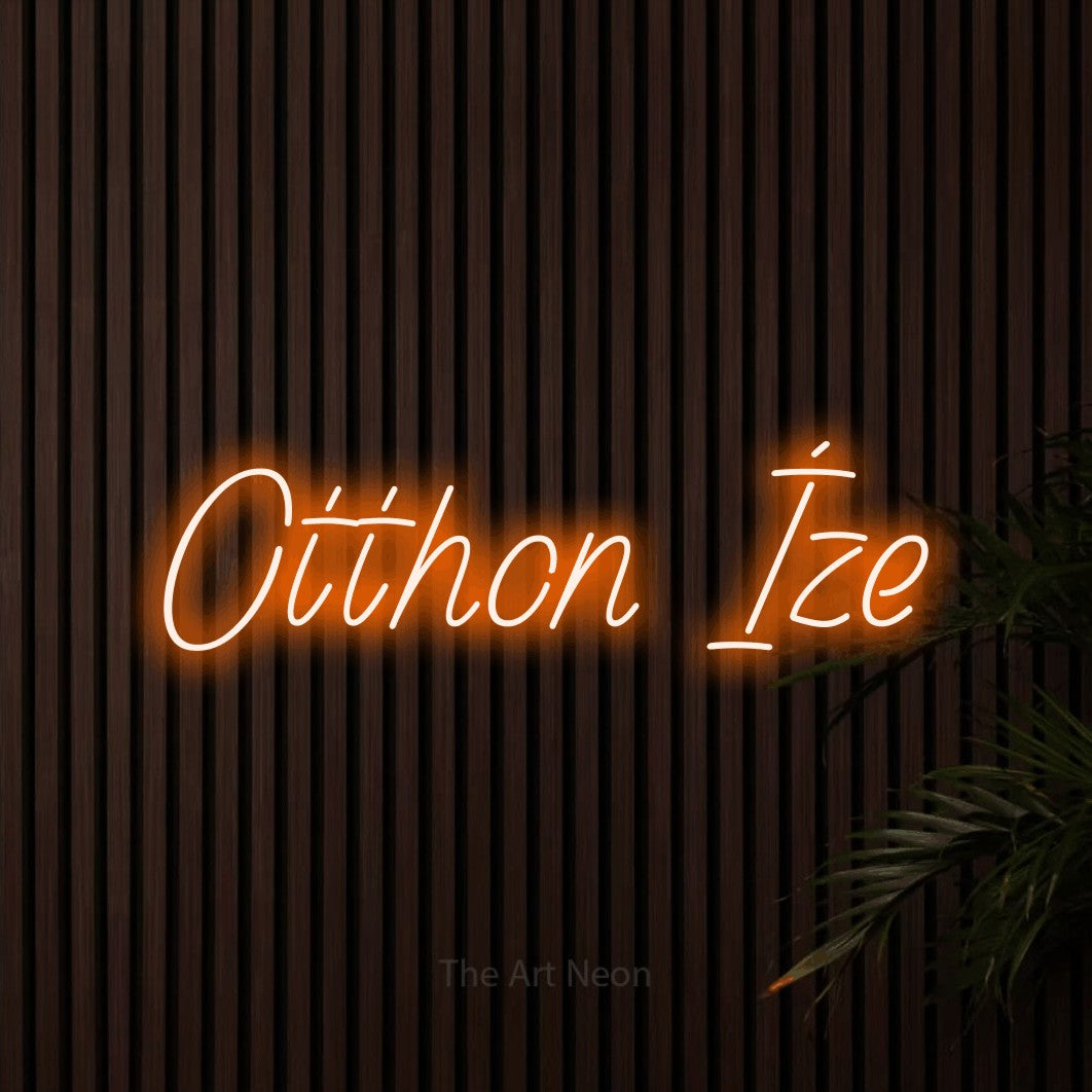 LED neon sign reading “Otthon Íze”, arranged in a single line.