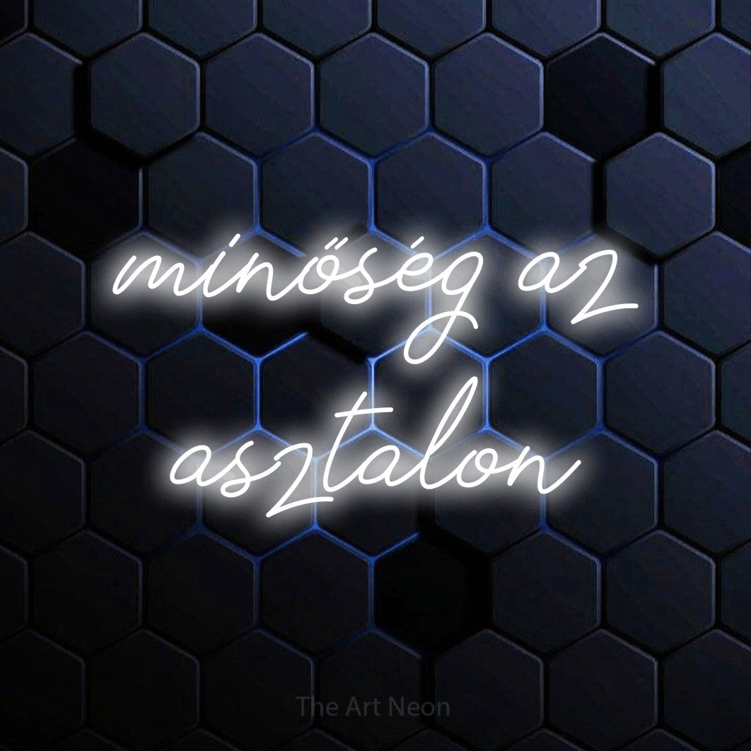 LED neon sign reading “minőség az asztalon”, arranged in two lines.