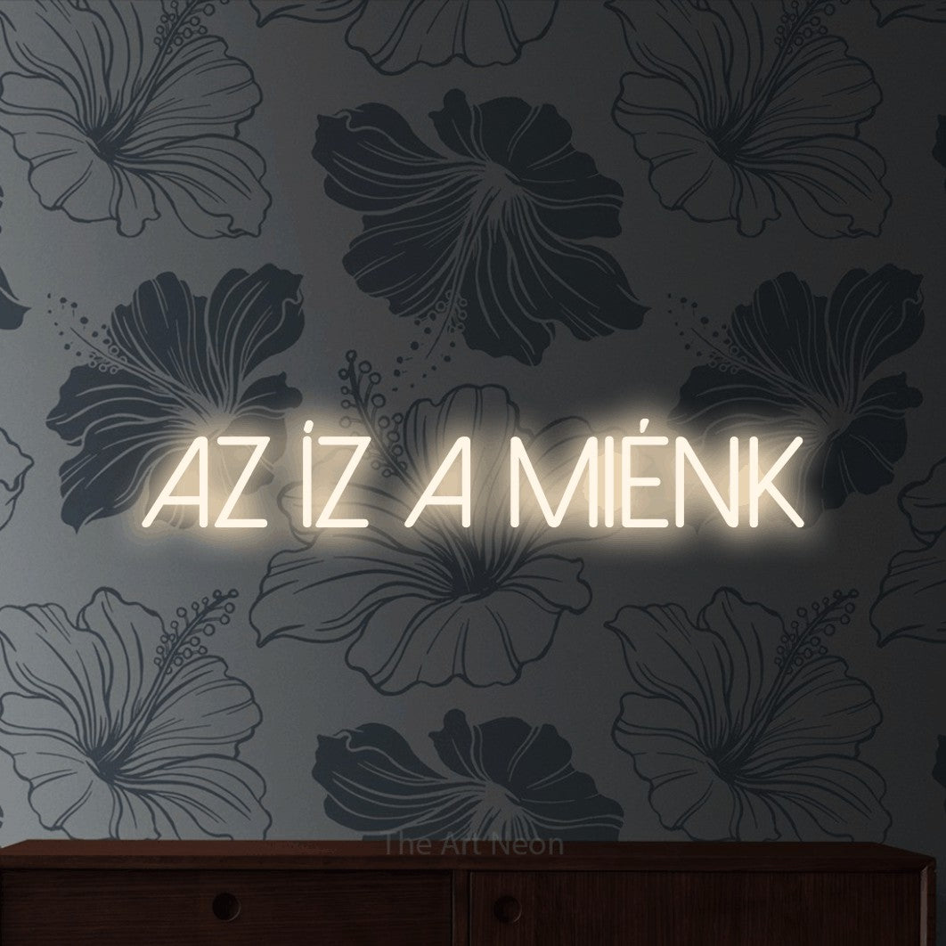 LED neon sign reading “Az Íz A Miénk”, arranged in a single line.