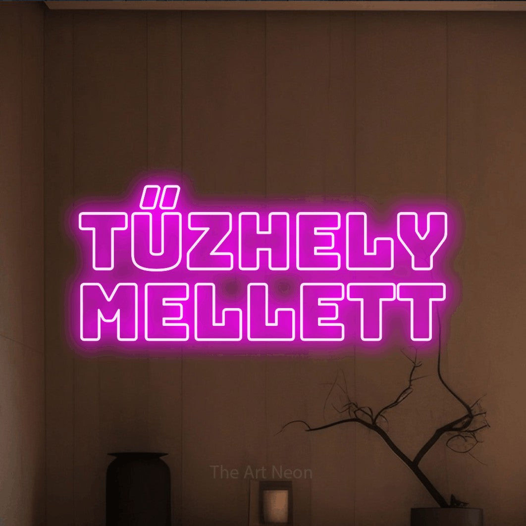 LED neon sign reading “Tűzhely Mellett”, arranged in two lines.