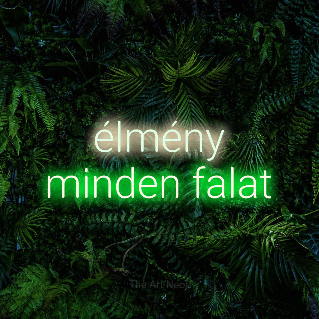 LED neon sign reading “élmény minden falat”, arranged in two lines.