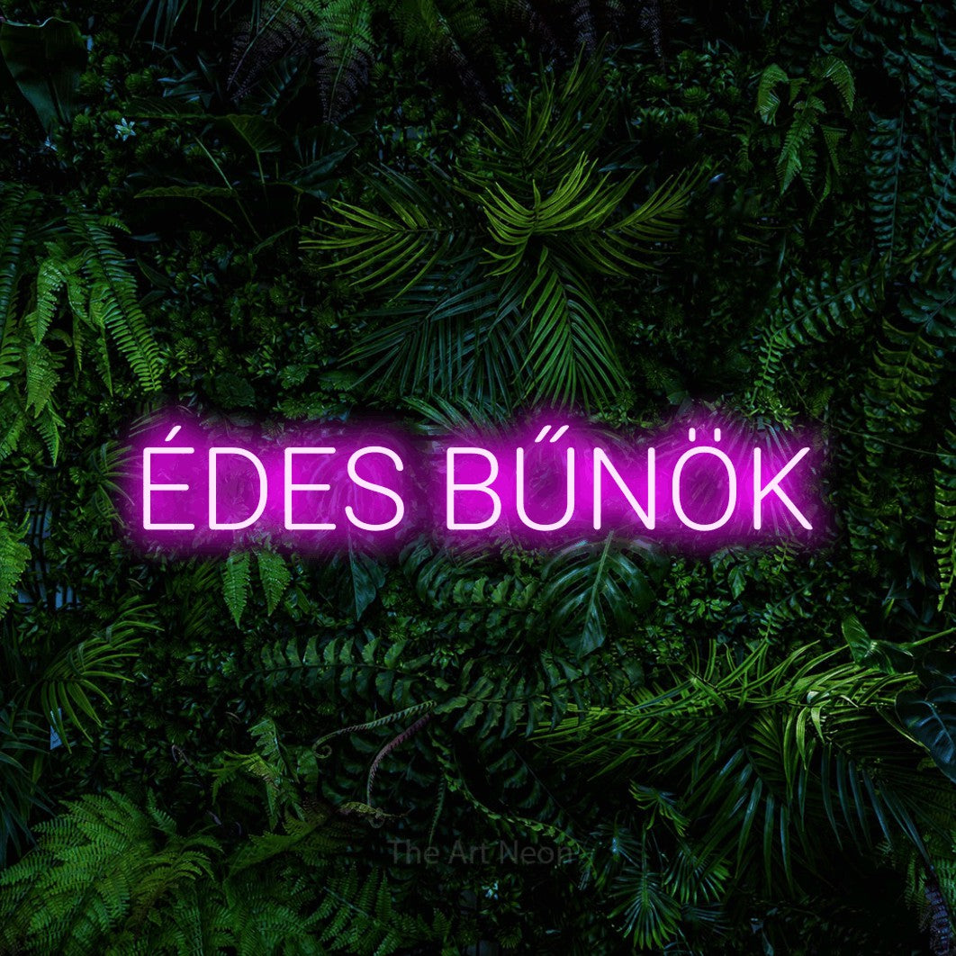 LED neon sign reading “ÉDES BŰNÖK”, arranged in a single line.