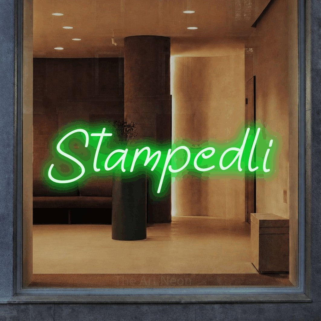 LED neon sign reading “Stampedli”, arranged in a single line.