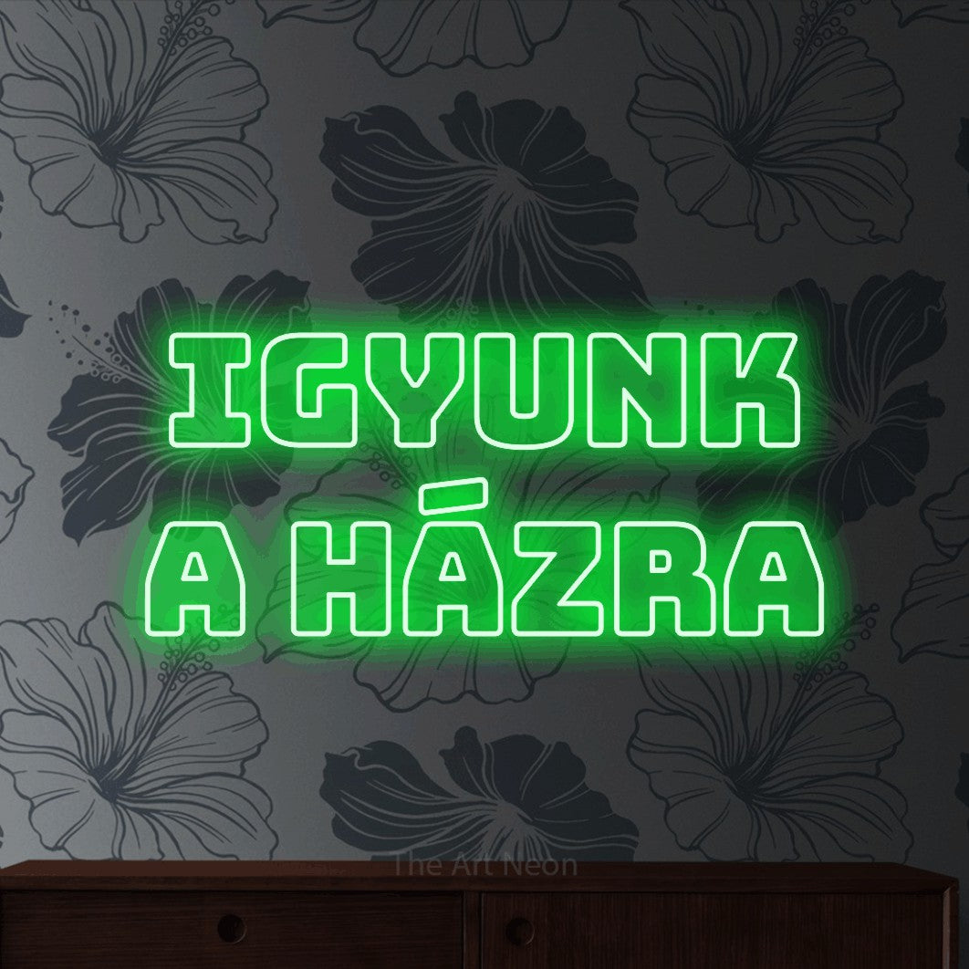 LED neon sign reading “IGYUNK a házra”, arranged in two lines.