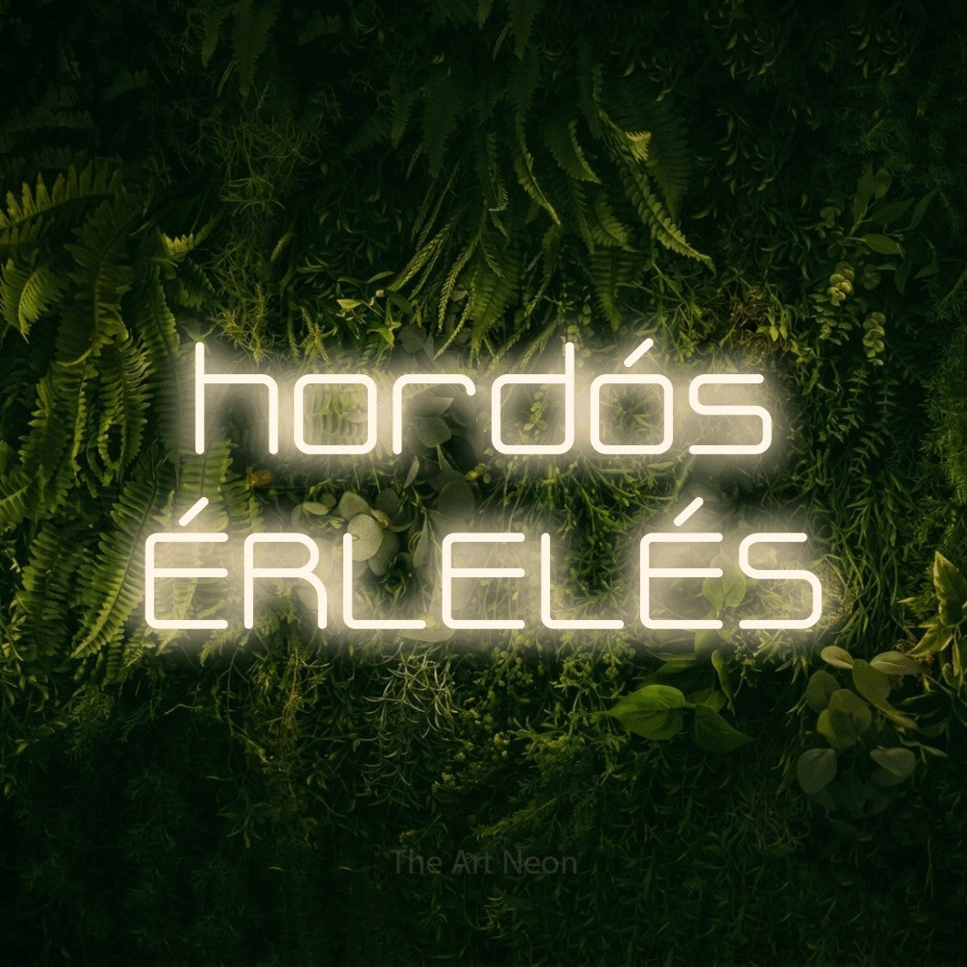 LED neon sign reading “hordós ÉRLELÉS”, arranged in two lines.