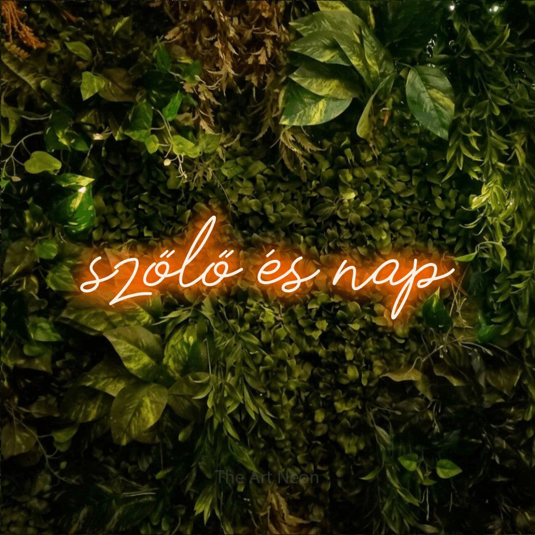 LED neon sign reading “szőlő és nap”, arranged in a single line.