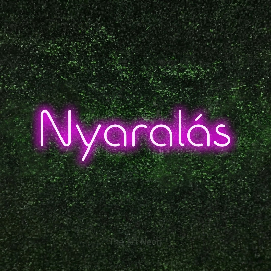 LED neon sign reading “Nyaralás”, arranged in a single line.