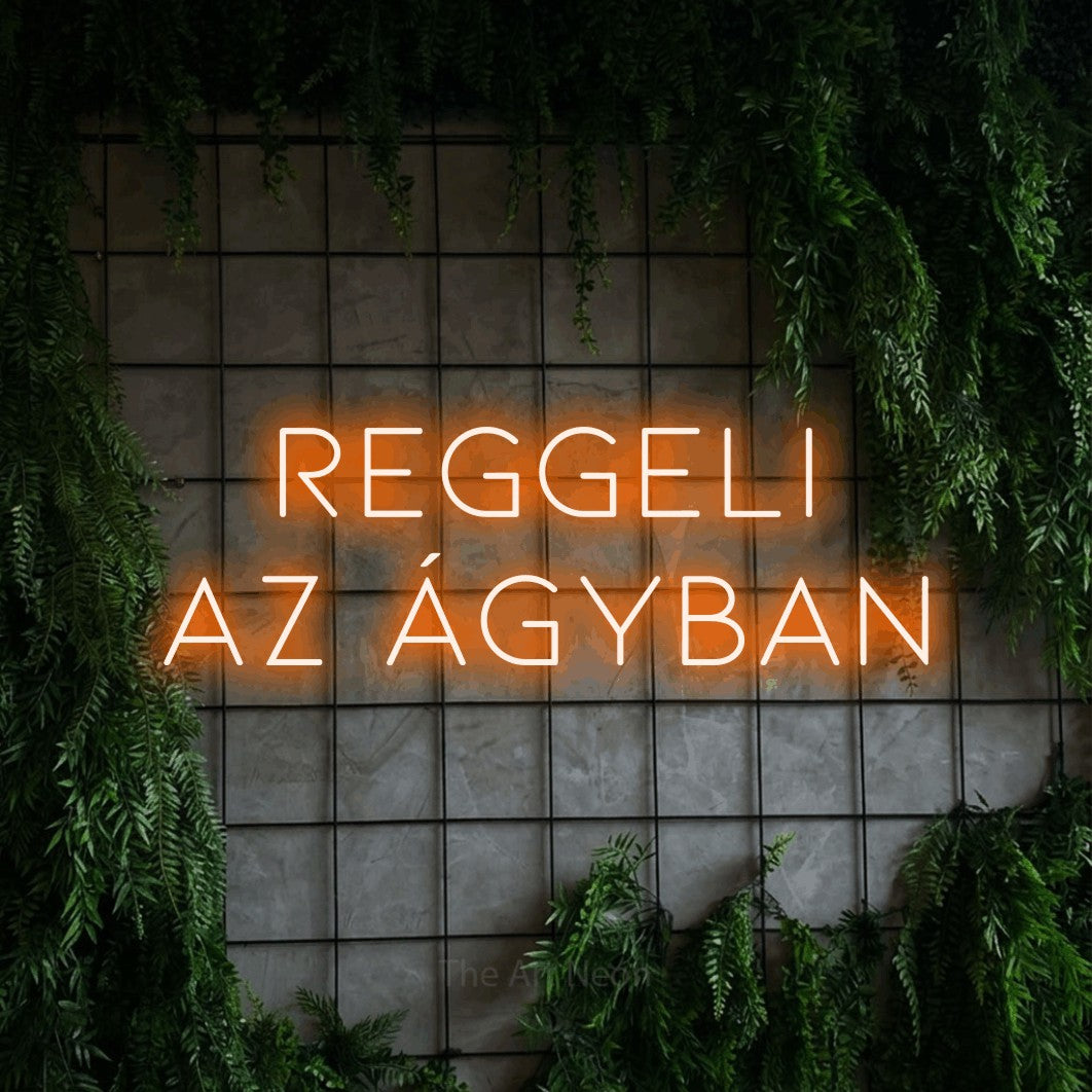 LED neon sign reading “reggeli az ágyban”, arranged in two lines.