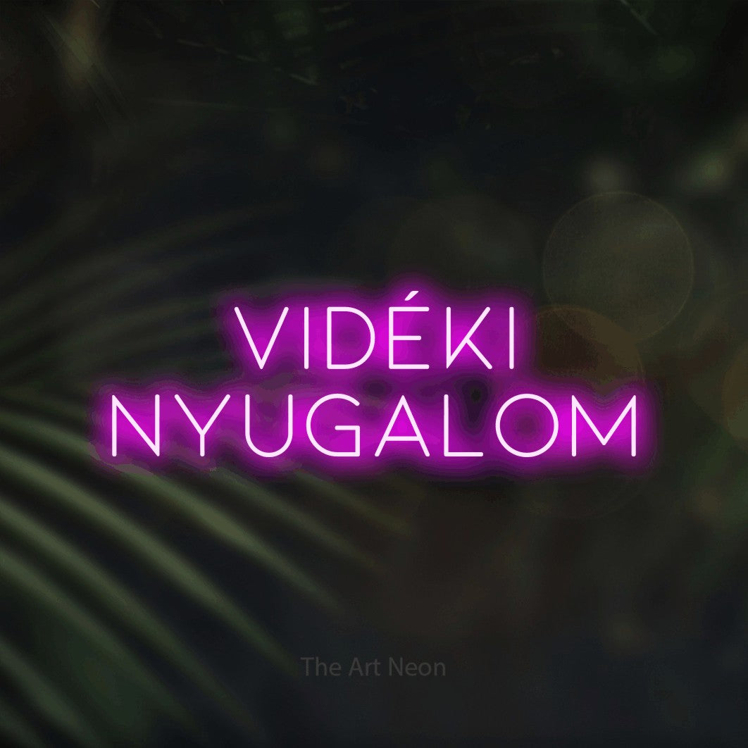 LED neon sign reading “Vidéki Nyugalom”, arranged in two lines.