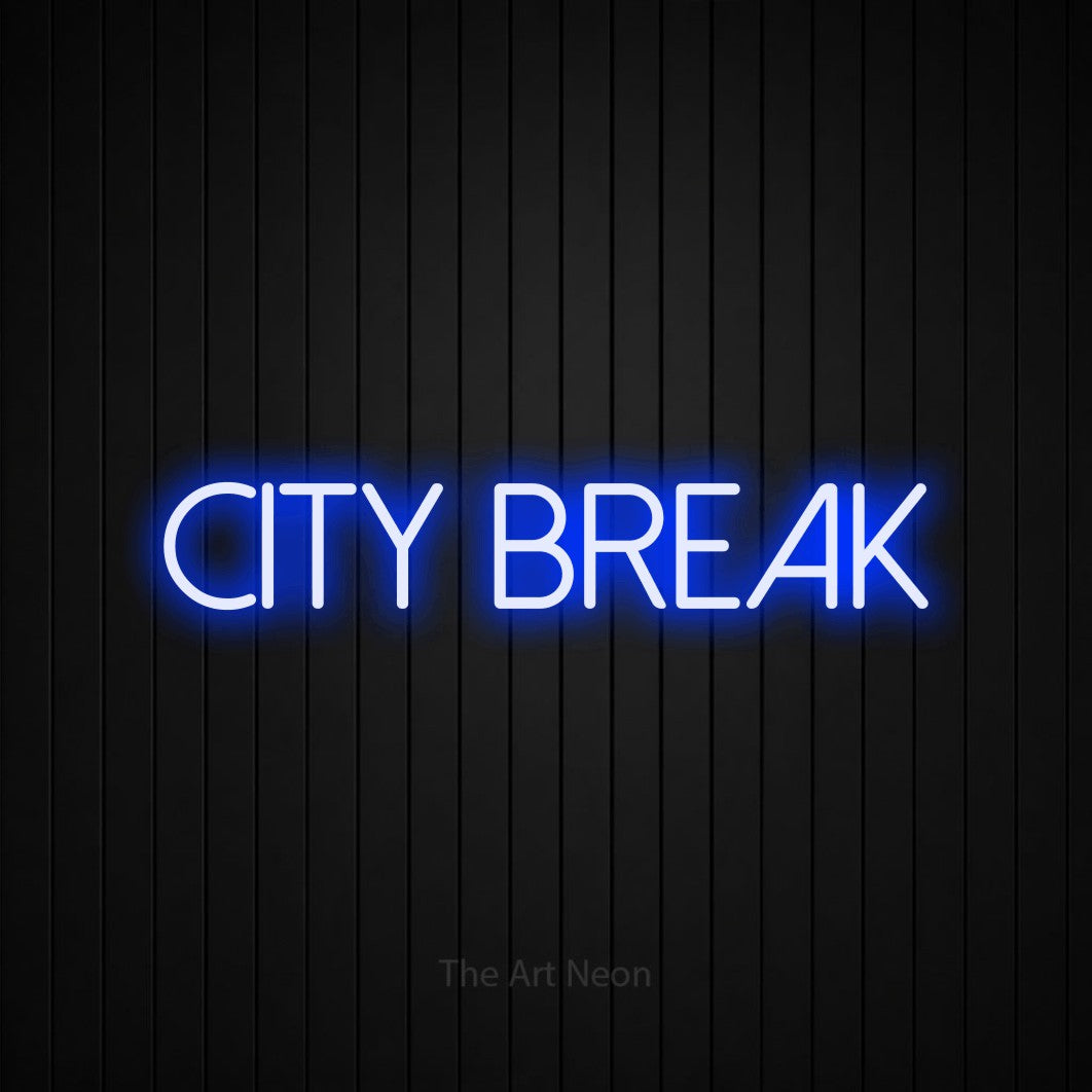 LED neon sign reading “city break”, arranged in a single line.