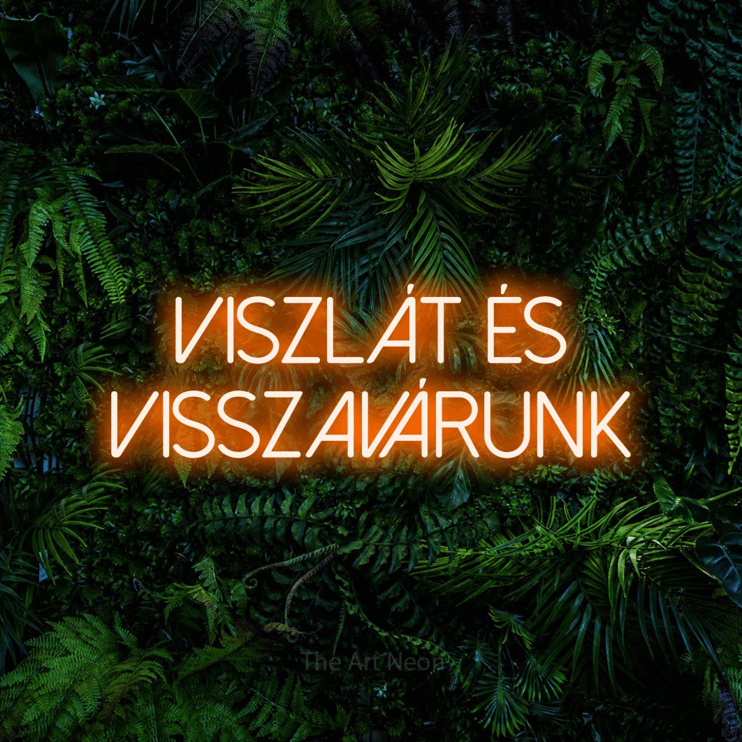 LED neon sign reading “Viszlát És Visszavárunk”, arranged in two lines.