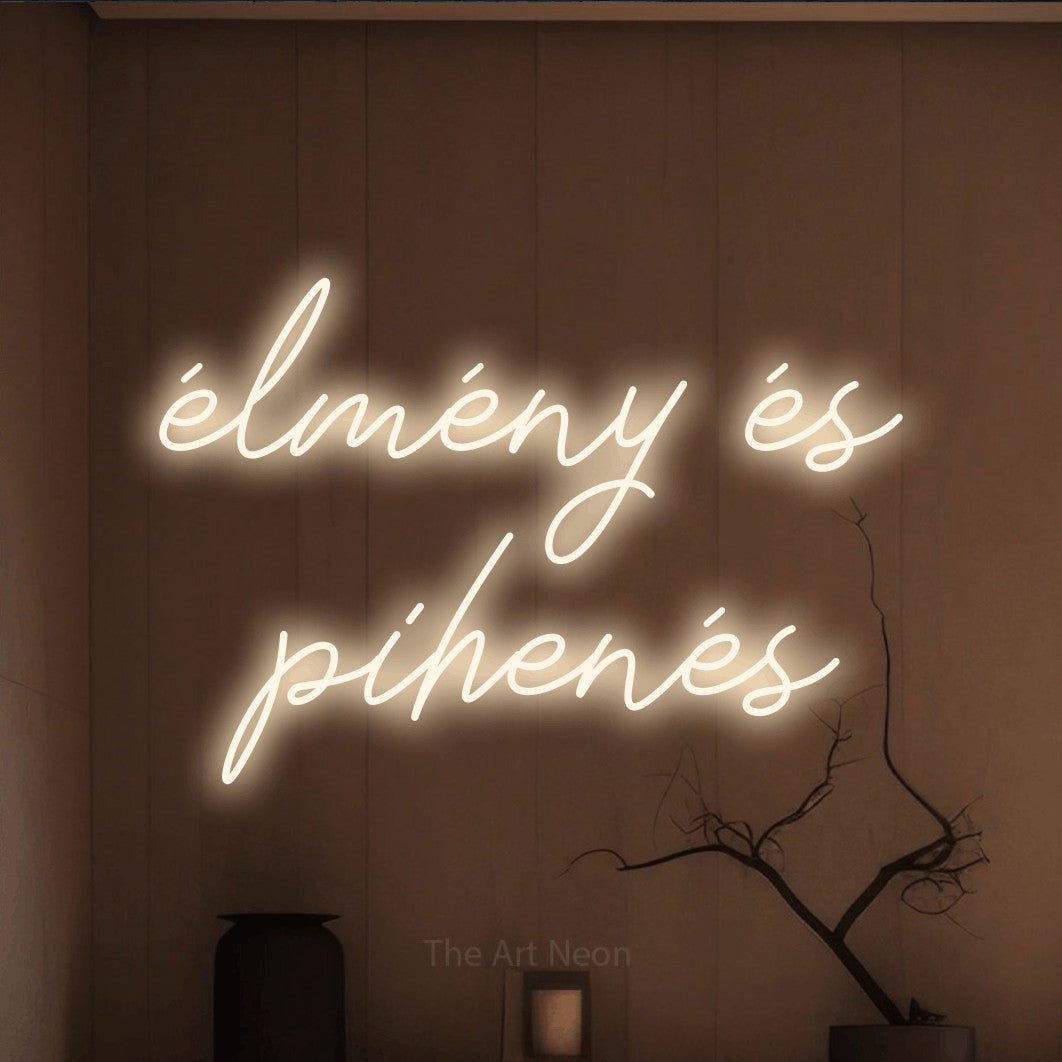 LED neon sign reading “élmény és pihenés”, arranged in two lines.