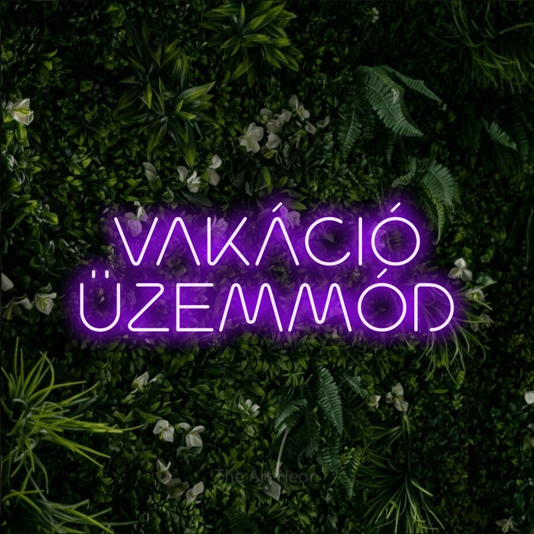 LED neon sign reading “VAKÁCIÓ ÜZEMMÓD”, arranged in two lines.