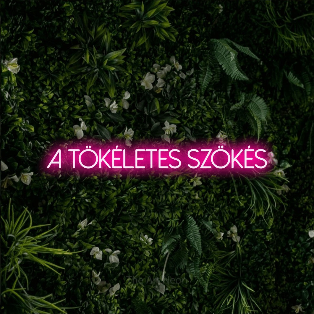 LED neon sign reading “A Tökéletes Szökés”, arranged in a single line.