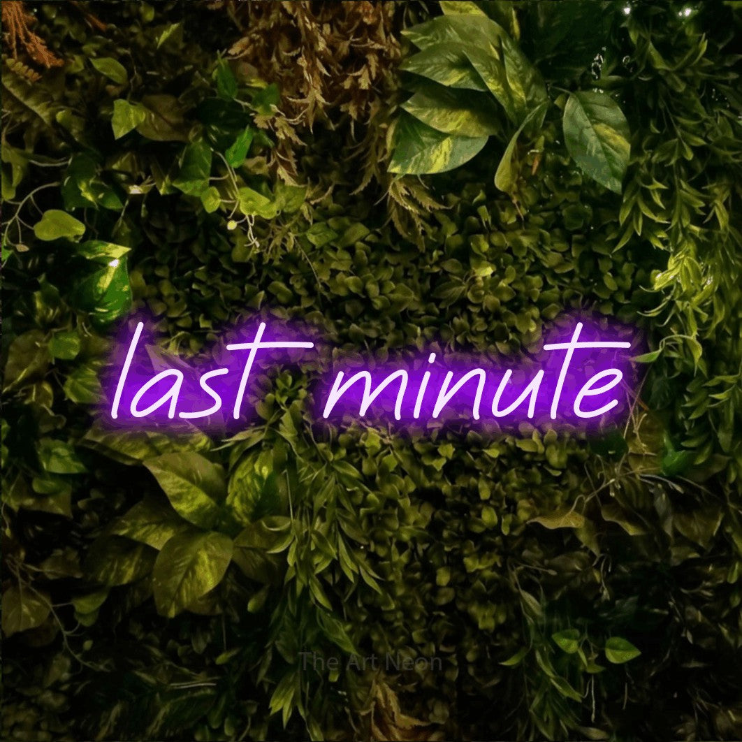 LED neon sign reading “last minute”, arranged in a single line.