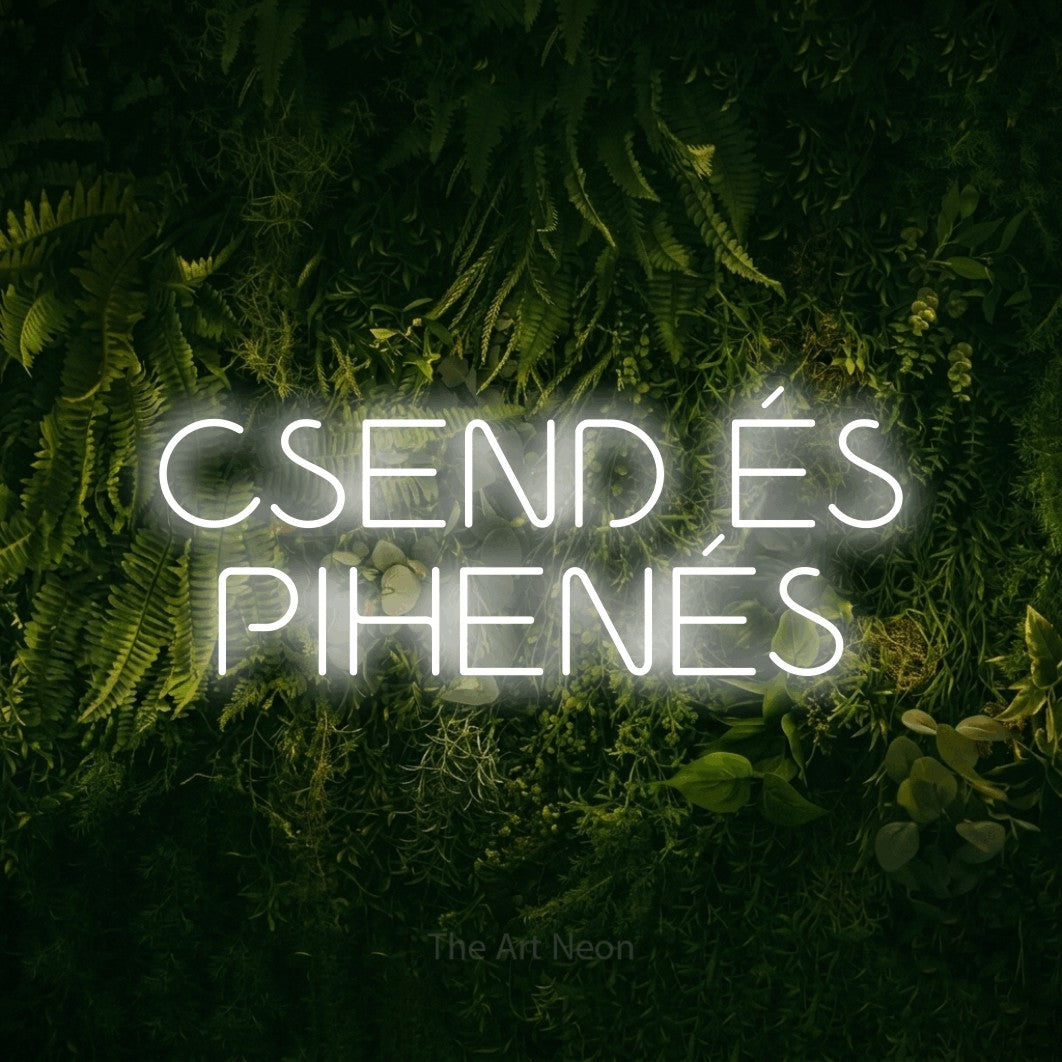 LED neon sign reading “CSEND ÉS PIHENÉS”, arranged in two lines.