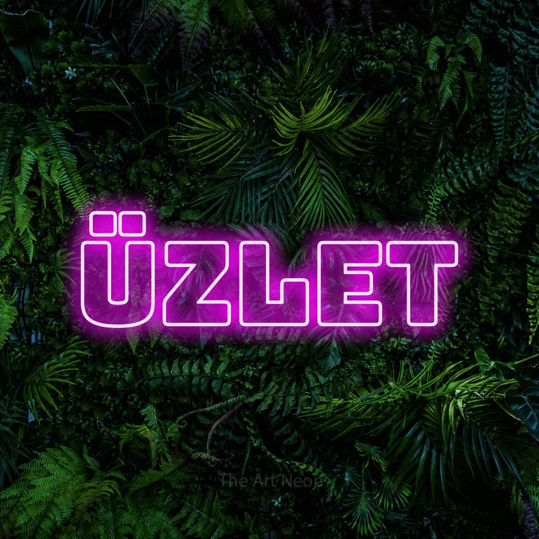 LED neon sign reading “Üzlet”, arranged in a single line.