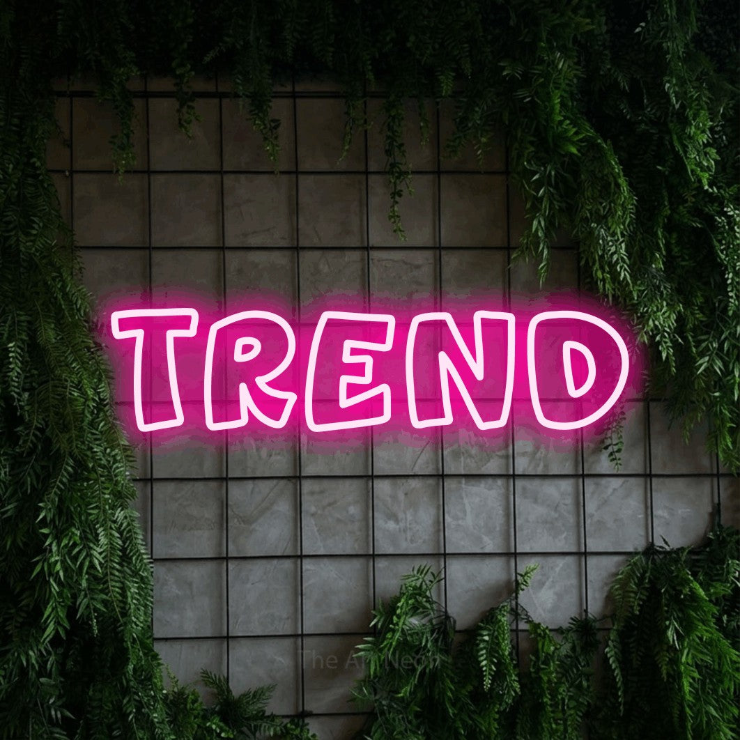 LED neon sign reading “TREND”, arranged in a single line.