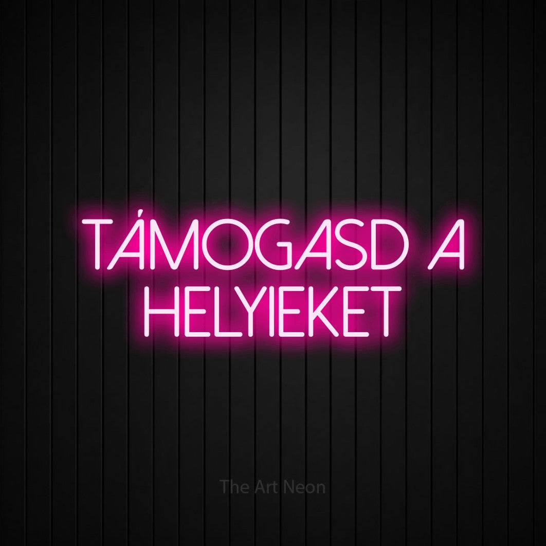 LED neon sign reading “támogasd a helyieket”, arranged in two lines.