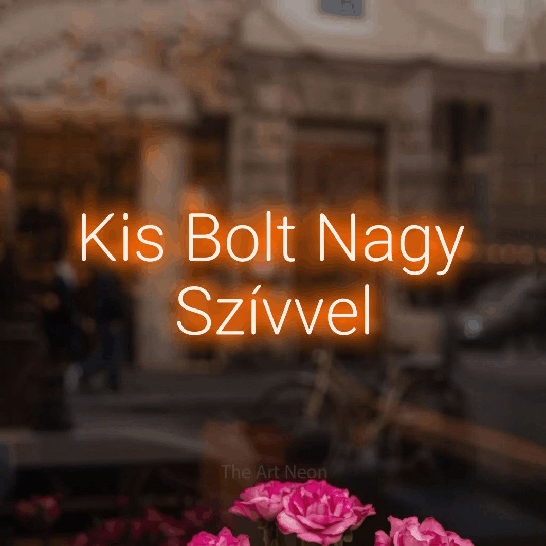 LED neon sign reading “Kis Bolt Nagy Szívvel”, arranged in two lines.