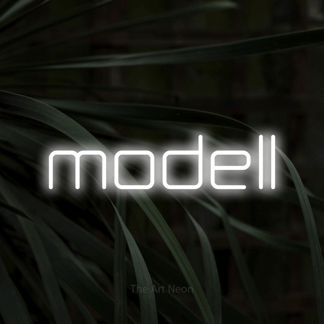 LED neon sign reading “modell”, arranged in a single line.