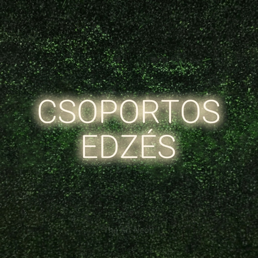 LED neon sign reading “CSOPORTOS EDZÉS”, arranged in two lines.