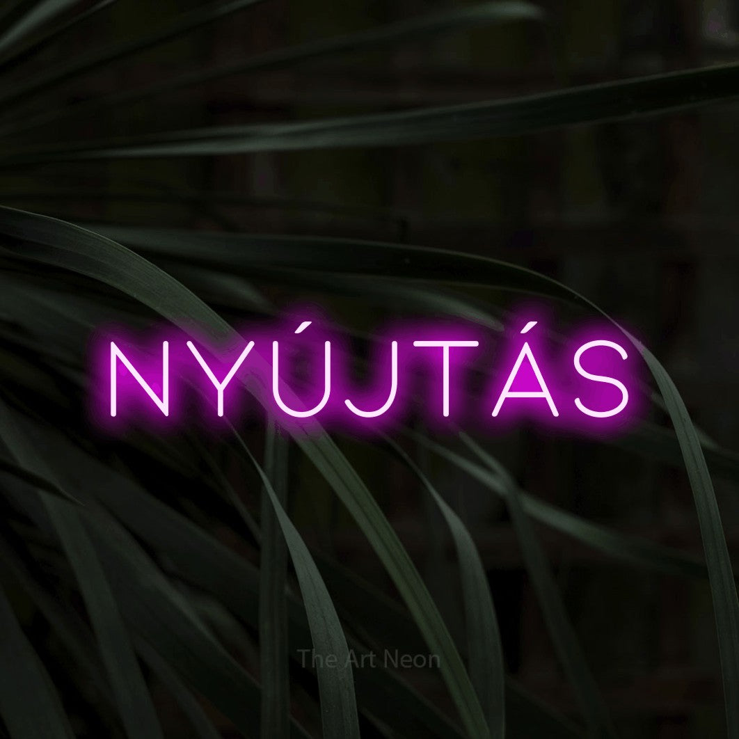 LED neon sign reading “NYÚJTÁS”, arranged in a single line.