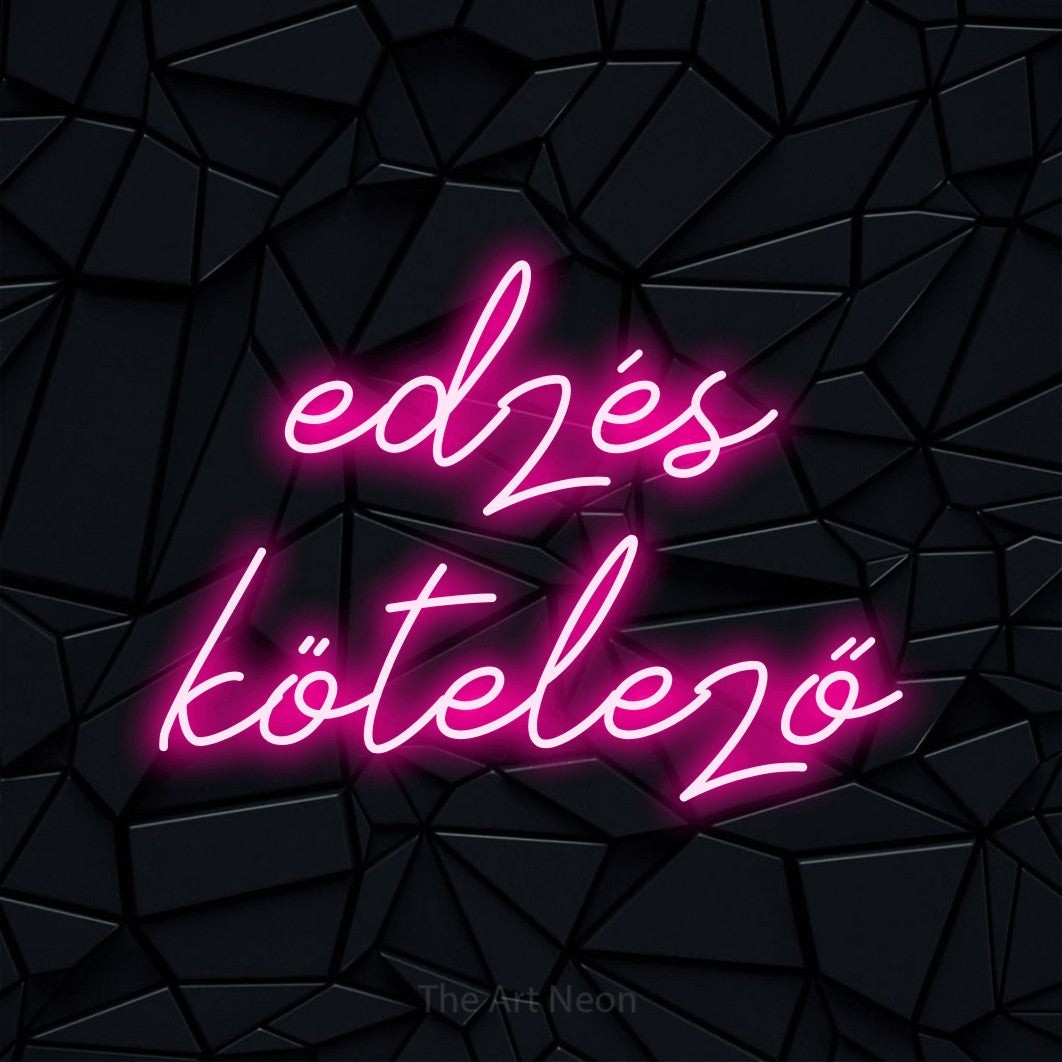 LED neon sign reading “edzés kötelező”, arranged in two lines.