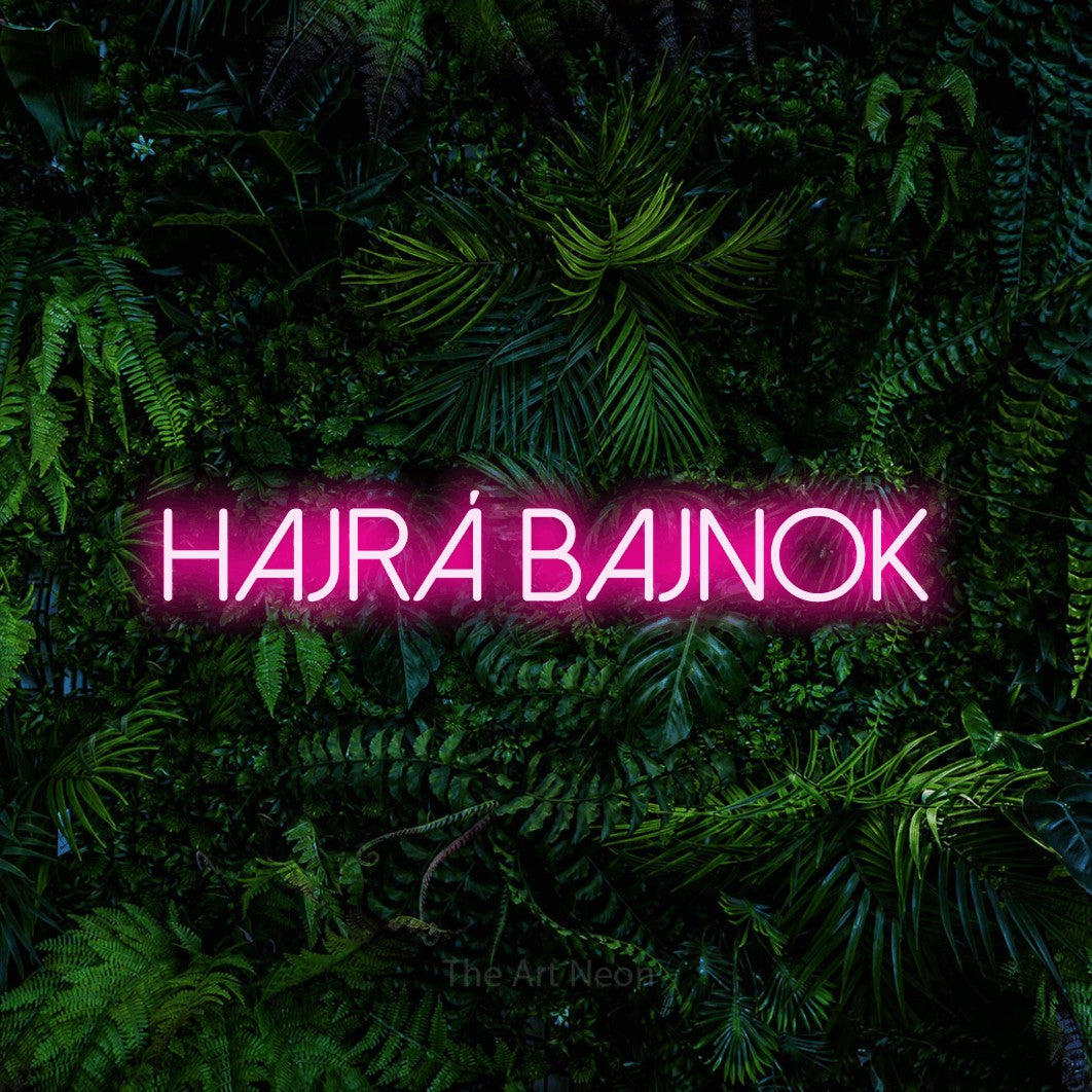 LED neon sign reading “Hajrá Bajnok”, arranged in a single line.