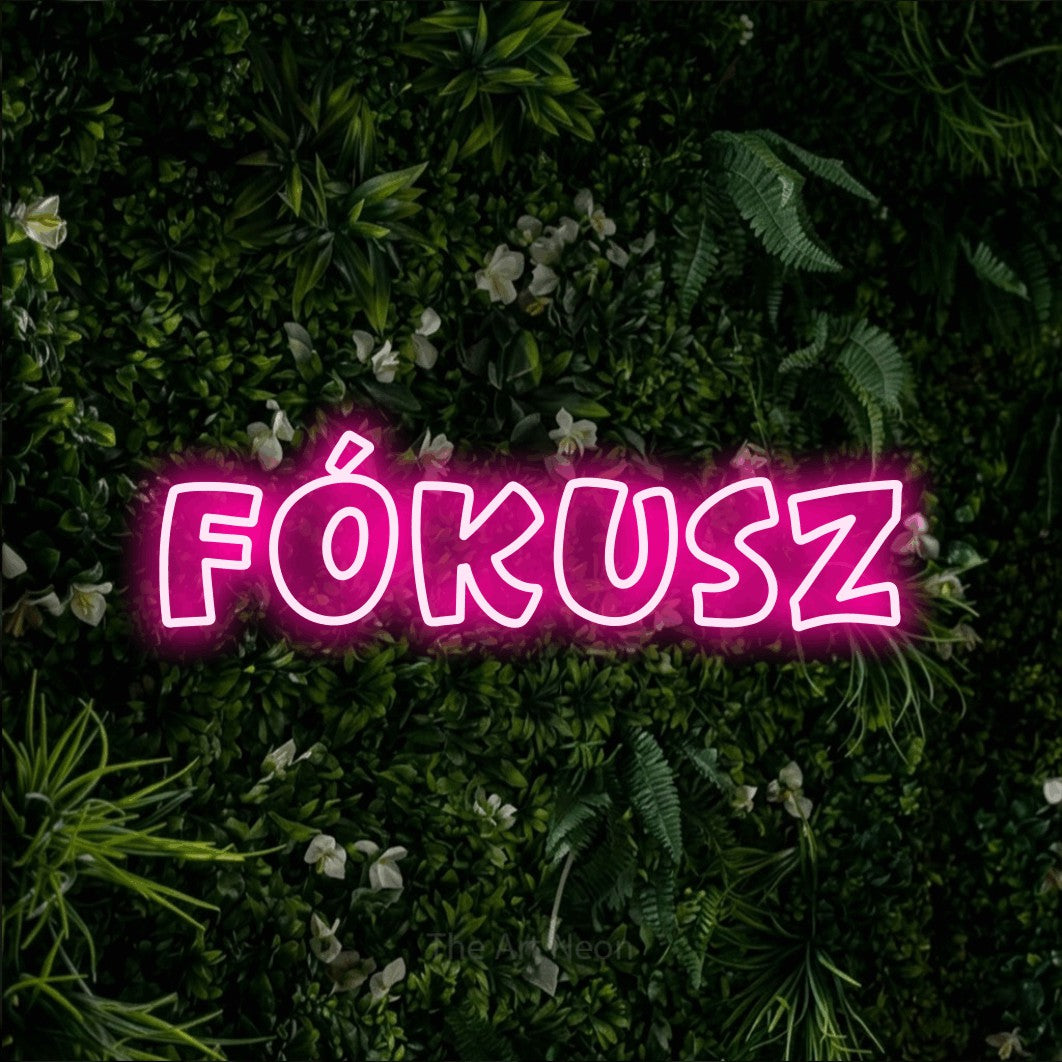 LED neon sign reading “FÓKUSZ”, arranged in a single line.