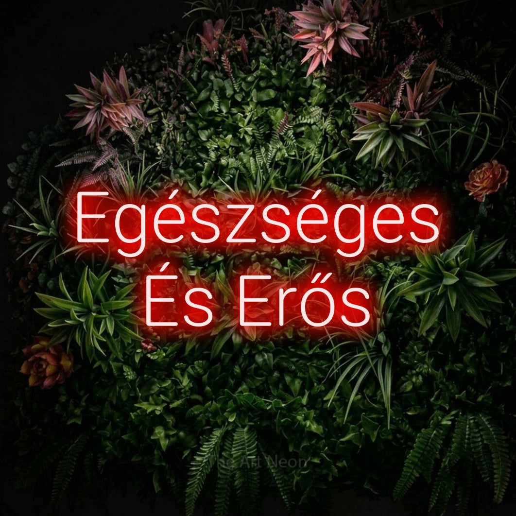 LED neon sign reading “Egészséges És Erős”, arranged in two lines.