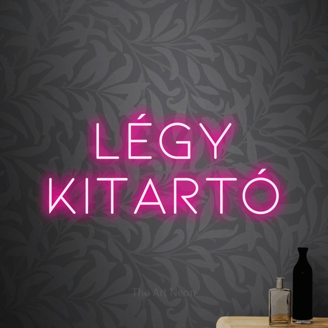 LED neon sign reading “Légy Kitartó”, arranged in two lines.