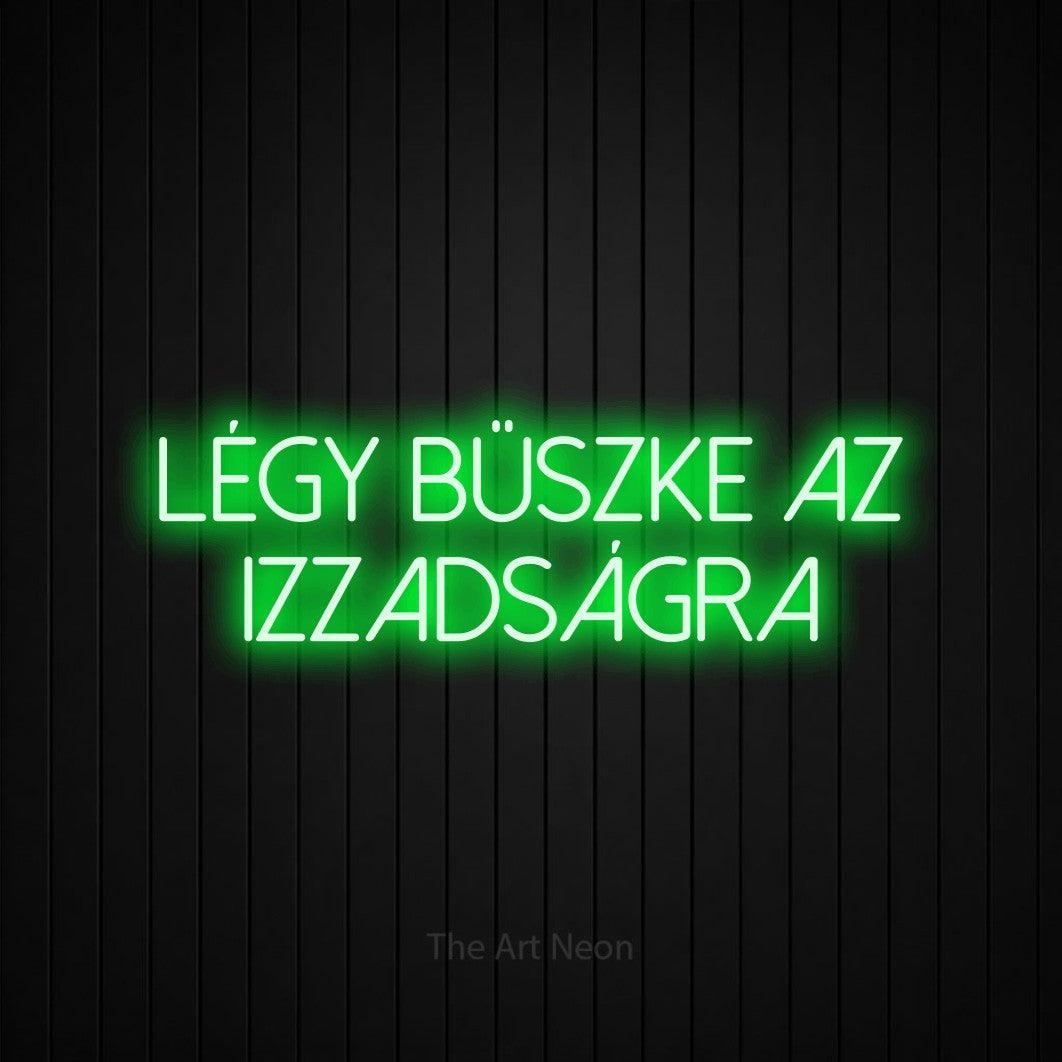 LED neon sign reading “LÉGY BÜSZKE AZ IZZADSÁGRA”, arranged in two lines.