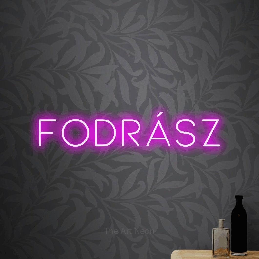 LED neon sign reading “fodrász”, arranged in a single line.
