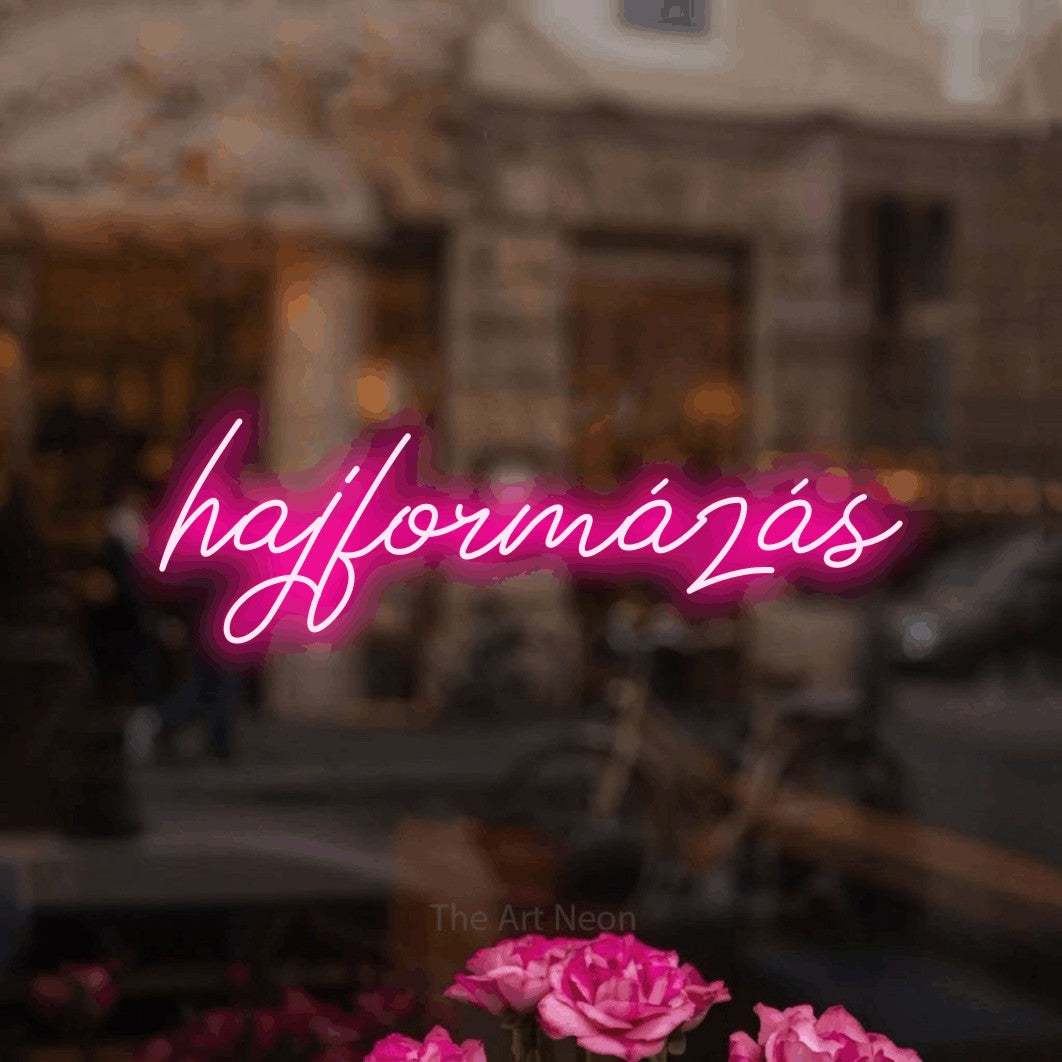 LED neon sign reading “hajformázás”, arranged in a single line.