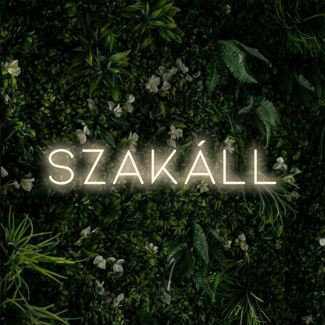 LED neon sign reading “szakáll”, arranged in a single line.