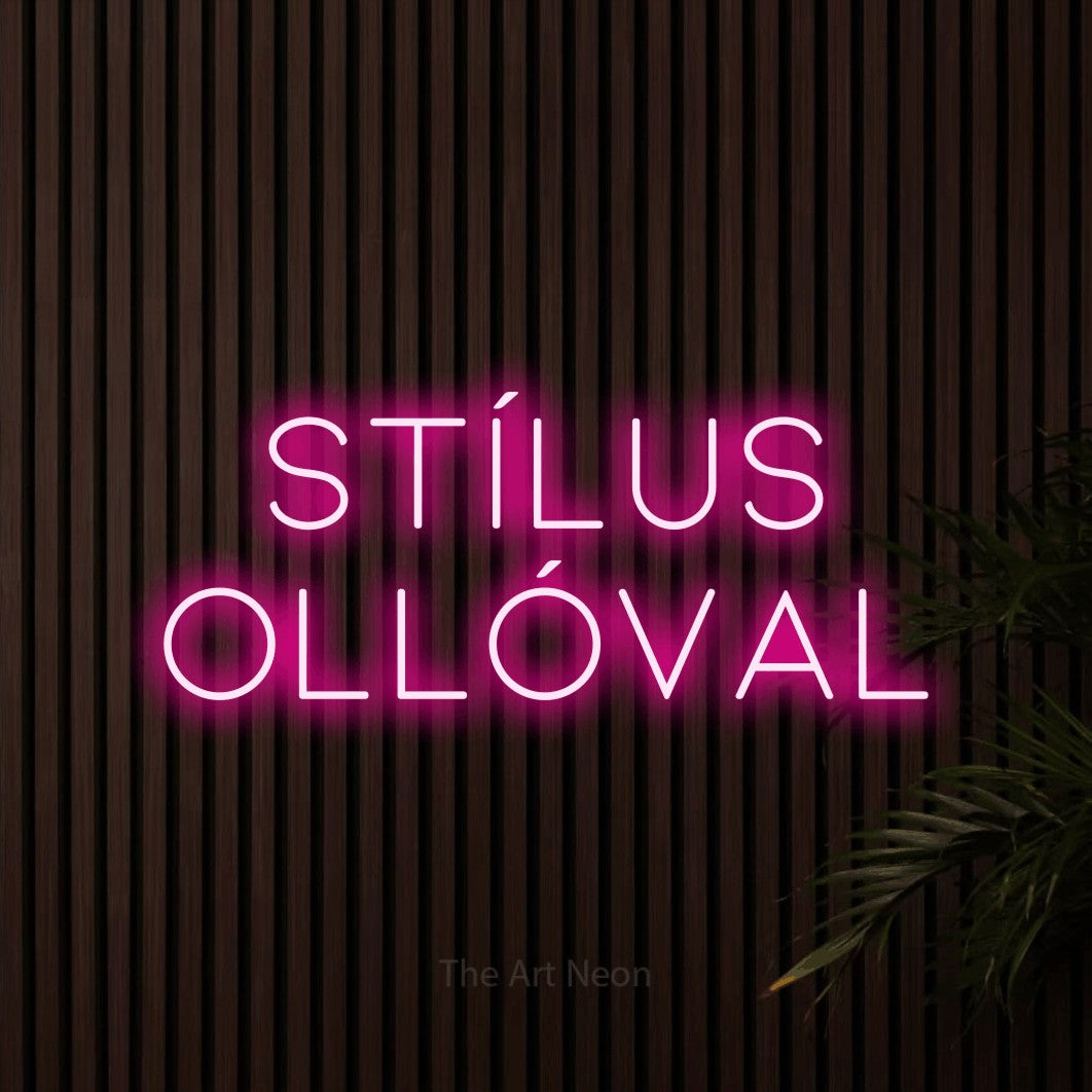 LED neon sign reading “stílus OLLÓVAL”, arranged in two lines.