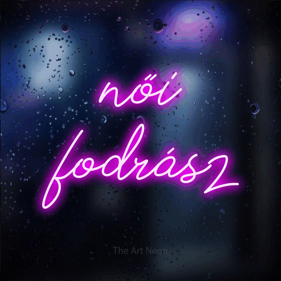 LED neon sign reading “női fodrász”, arranged in two lines.