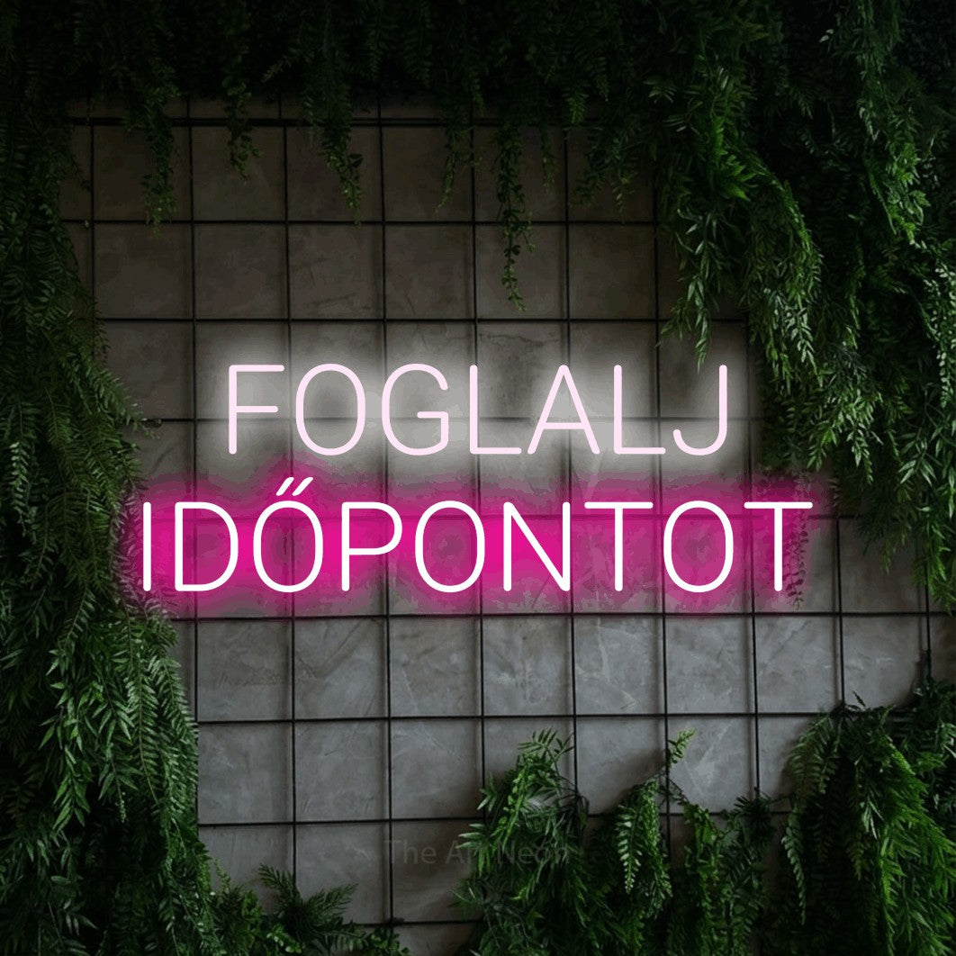 LED neon sign reading “FOGLALJ IDŐPONTOT”, arranged in two lines.